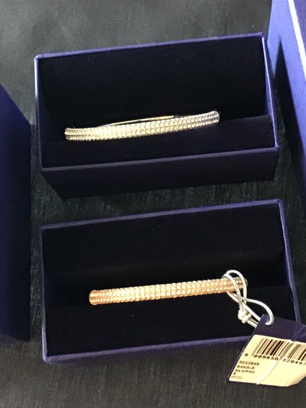 SWAROVSKI Bangle Bracelets- Gold & Silver. Each in beautiful condition w/ boxes
